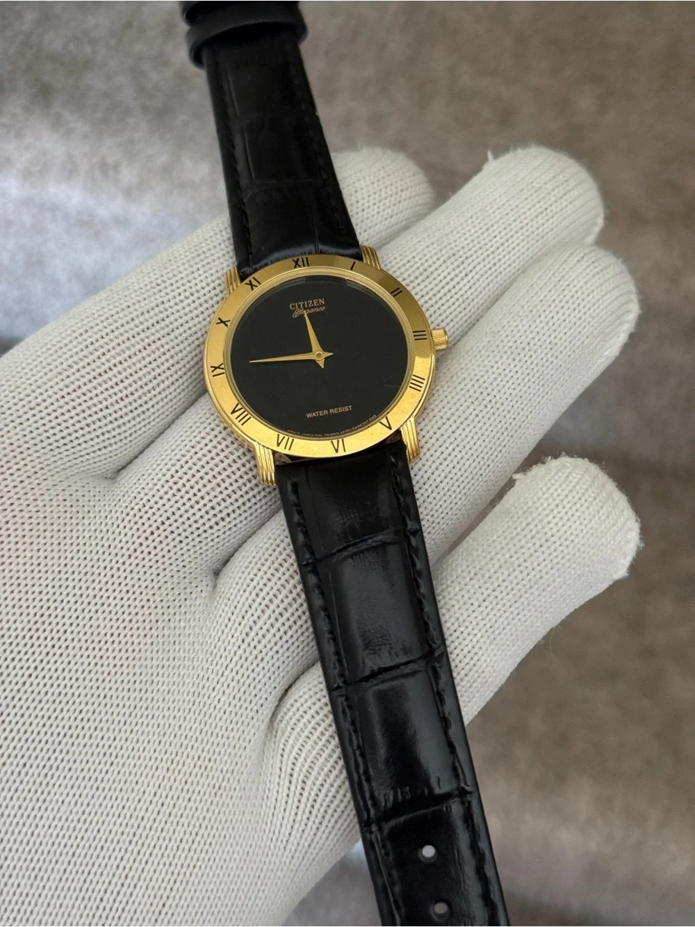 Citizen Elegance Gold Tone Case with Black Dial and Black Leather Strap